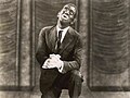 Al Jolson in The Jazz Singer (1927), the first feature film to include scenes of fully synchronized sound that is also known for its controversial use of blackface.